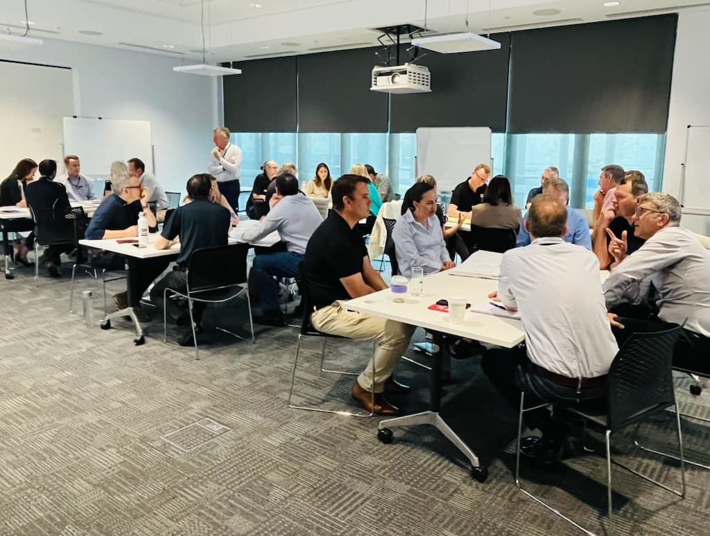 Small-group dialogue during an In-Q workshop